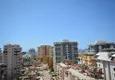 Доступная покупка Квартира в Махмутларе с видом на горы и море в благоустроенном комплексе 24