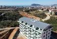 Купить Квартира в районе Оба двухкомнатная в современном жилом комплексе  5 
