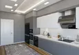 Доступная покупка Квартира в Алании – район Оба с отдельной кухней от инвестора в строящемся комплексе 10 