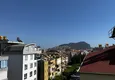 Доступная покупка Большой дуплекс в центре Алании с видом на горы 29