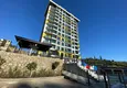 Купить Квартира в Махмутларе с видом на горы в современном новом комплексе 1