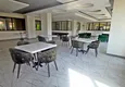 Купить Квартира в Махмутларе меблированная с отдельной кухней и видом на горы планировки 4+1 16