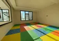 Купить Квартира в Махмутларе с видом на горы в современном новом комплексе 25