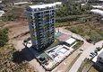 Купить Квартира в Махмутларе с видом на горы в современном новом комплексе 27