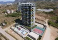 Купить Квартира в Махмутларе с видом на горы в современном новом комплексе 28