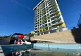 Купить Квартира в Махмутларе с видом на горы в современном новом комплексе 3