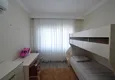 Доступная покупка Квартира в Махмутларе меблированная, с 4 спальнями и отдельной кухней 21