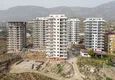 Купить Квартиры в Алании - район Махмутлар в строящемся жилом комплексе 4