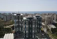 Купить Двухкомнатная квартира под ключ в Алании, район Махмутлар в резиденции отельного типа  5 