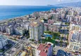 Купить Квартиры в Махмутларе трехкомнатные в строящемся комплексе 1