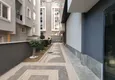 Купить Квартира в Махмутларе в новостройке - двухкомнатная меблированна 10