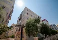 Купить Трехкомнатная квартира для аренды в центре Анталии с мебелью и отдельной кухней 1