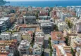 Купить Просторная городская квартира в центре Алании, в жилом турецком доме 6