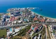 Купить Недвижимость под ВНЖ. Квартира с мебелью, личной сауной и видом на море в таунхаусе – Алания, Тюрклер 4 