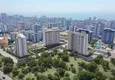 Купить Апартаменты популярной планировки 1+1 в 500 метрах от моря Мерсин, Тэдже 3 