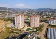 Купить Трехкомнатная квартира с панорамным видом на море в районе Паяллар, Алания 1 