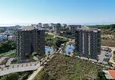 Купить Квартиры и пентхаусы в строящемся комплексе в Алании, район Авсаллар 1