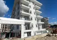 Купить Предложение от инвестора - квартира 1+1 в строящемся комплексе в районе Махмутлар 1