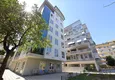 Купить Городская трёхкомнатная квартира с новой мебелью в новостройке - центр Алании 1