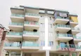 Купить Двухкомнатная квартира с мебелью в комплексе с бассейном – район Махмутлар 2