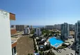 Доступная покупка Трехкомнатные апартаменты с видом на море и горе в уютном районе Томюк-Эрдемли 15 