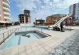 Купить Просторная трехкомнатная квартира в самом перспективном районе Мерсина 4