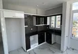 Доступная покупка Трехкомнатная квартира, с видом на горы в районе Томюк-Мерсин 8 