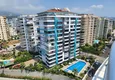 Купить дешево Пентхаус-дуплекс 4+1 меблированный с видом на море и горы, район Махмутлар – Алания 37