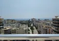 Купить дешево Пентхаус-дуплекс 4+1 меблированный с видом на море и горы, район Махмутлар – Алания 42