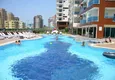 Купить Меблированная трехкомнатная квартира в комплексе с частным пляжем – район Махмутлар 3