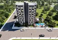 Купить Квартиры на этапе строительства в уютном жилом комплексе в районе Тедже-Мерсин 4