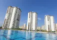 Купить Апартаменты в новом современном жилом комплексе в районе Чешмели-Мерсин 12 