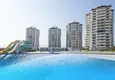 Купить Апартаменты в новом современном жилом комплексе в районе Чешмели-Мерсин 13 