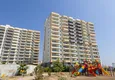 Купить Апартаменты на берегу моря в новом жилом комплексе район Аяш-Мерсин 7 