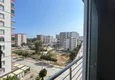 Купить Квартира 2+1 с отдельной кухней в 500 метрах от моря в районе Давултепе-Мерсин 15 