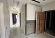 Доступная покупка Квартира 4+1 c отдельной кухней и застекленным балконом в районе Мезитли-Мерсин 18 