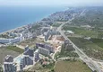 Купить Новый жилой комплекс комфорт-класса на этапе строительства в районе Томюк-Мерсин 19