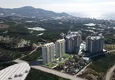 Купить Квартира 2+1 с мебелью и видом на горы в современном жилом комплексе, район Махмутлар – Алания 4 