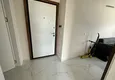 Доступная покупка Частично меблированная двухкомнатная квартира с видом на горы в новом современном жилом комплексе – Алания, район Махмутлар 1 