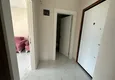 Доступная покупка Частично меблированная двухкомнатная квартира с видом на горы в новом современном жилом комплексе – Алания, район Махмутлар 2 