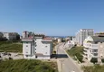 Купить Новый инвестиционный проект жилого комплекса в Авсалларе с закрытой благоустроенной территорией 21 