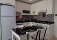 Доступная покупка Двухкомнатная меблированная квартира в 100 метрах от моря - район Махмутлар, Алания 9 