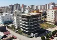 Доступно Квартиры 1+1 на стадии строительства в районе Эрдемли-Мерсин 3 