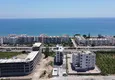 Доступно Квартира 1+1 с видом на море и горы в районе Эрдемли-Мерсин 7 