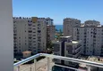 Доступная покупка Меблированная квартира 1+1 с видом на море район Томюк-Мерсин 12