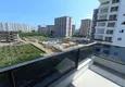 Доступная покупка Квартира 1+1 с чистовой отделкой, частично вид на море и горы в районе Томюк-Мерсин 11 