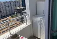 Доступная покупка Меблированная квартира 1+1 с видом на море район Томюк-Мерсин 13