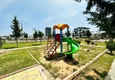 Купить Городская четырехкомнатная квартира в районе Енишехир-Мерсин 6 