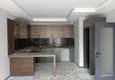 Доступная покупка Квартира 1+1 в 250 метрах от моря,с чистовой отделкой, район Томюк-Мерсин 1 