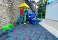 Купить Пентхаус-дуплекс 4+1 с мебелью, застеклёнными балконами, видом на море и горы, район Тосмур – Алания 11